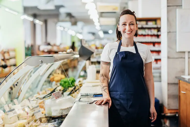 Photo d'une adhérente d'une coopérative de commerçants détaillants